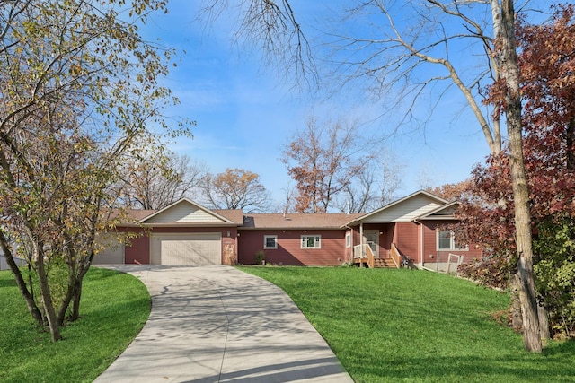 ranch-style house featuring a front yard and a garage