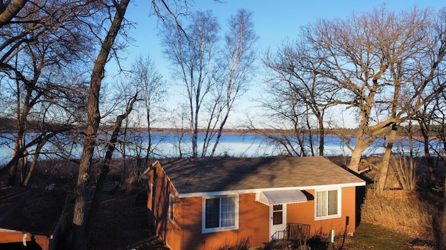 view of front facade featuring a water view