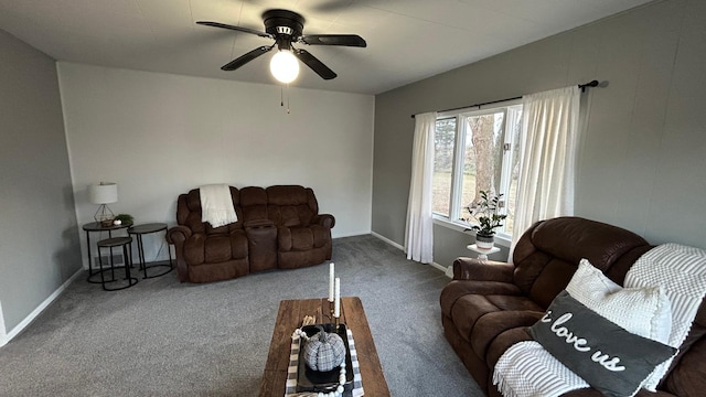 carpeted living room featuring ceiling fan