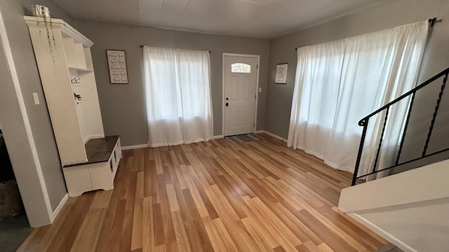 entrance foyer featuring light wood-type flooring