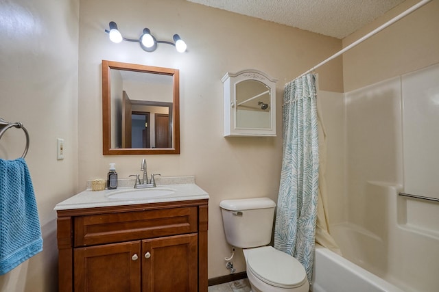 full bathroom with shower / bath combo, vanity, a textured ceiling, and toilet