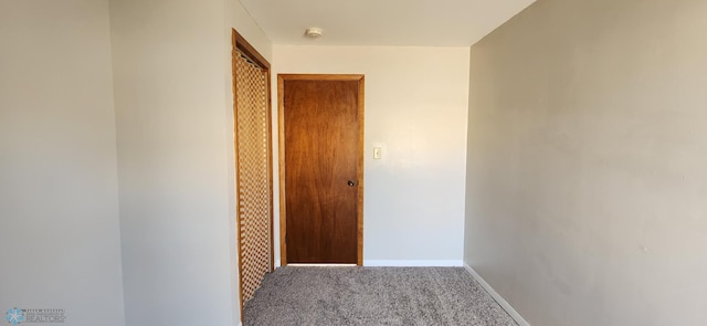 corridor featuring carpet floors