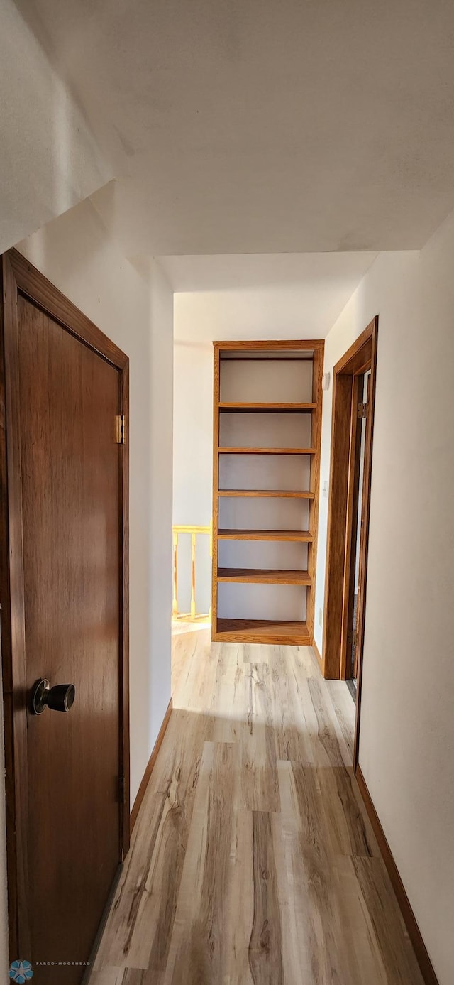 hall featuring light wood-type flooring