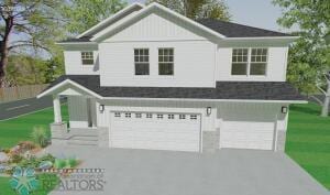 8447 61st St S, Horace, ND 58047 - view of front of house with an attached garage, driveway, and a front yard
