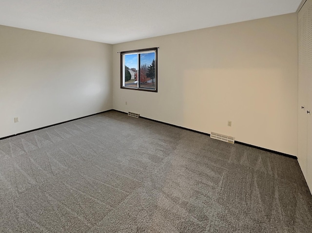 spare room with carpet floors