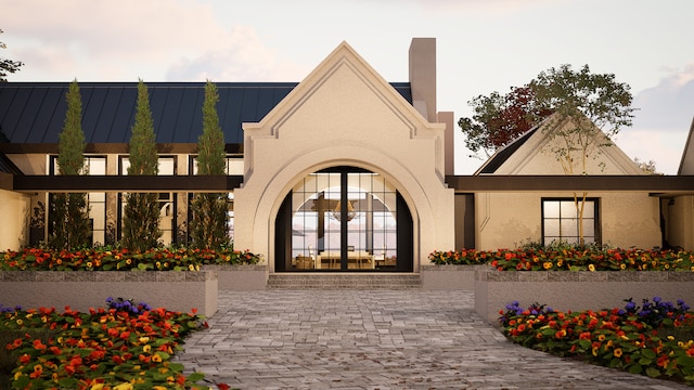 entrance to property featuring french doors