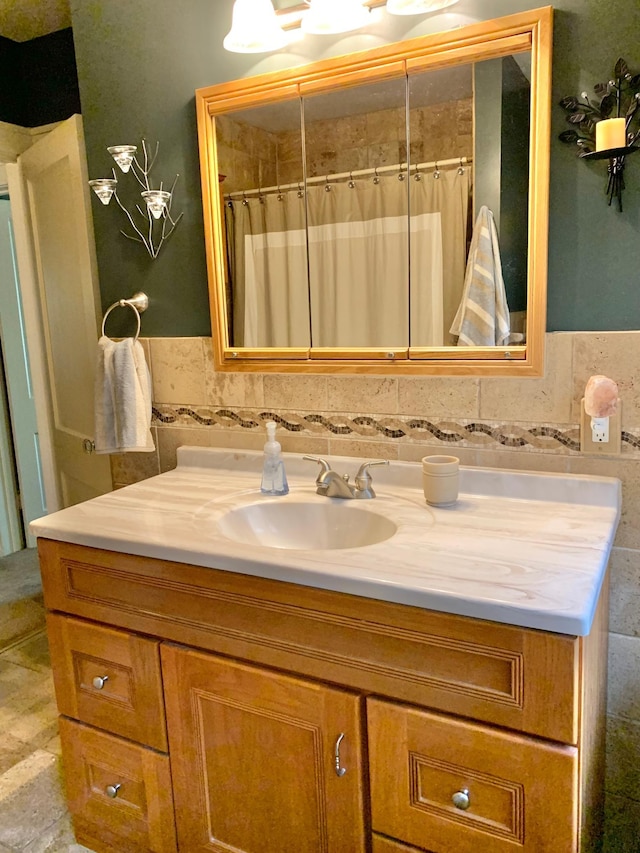 bathroom with tile walls and vanity