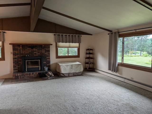 unfurnished living room with a baseboard radiator, carpet, vaulted ceiling with beams, and a fireplace