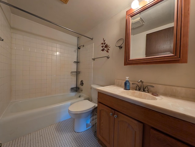 full bathroom with vanity, toilet, tiled shower / bath combo, and tile patterned flooring