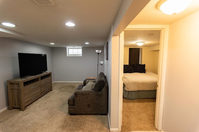 living room featuring light carpet, baseboards, and recessed lighting