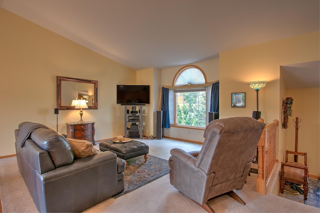 living room featuring light colored carpet and lofted ceiling