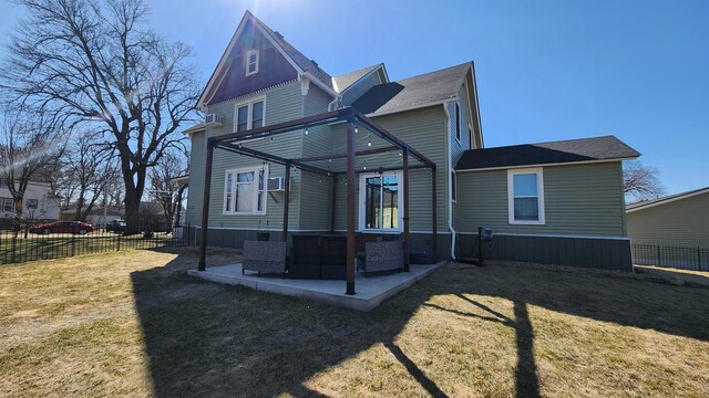 rear view of house with a patio area, fence, cooling unit, and a lawn