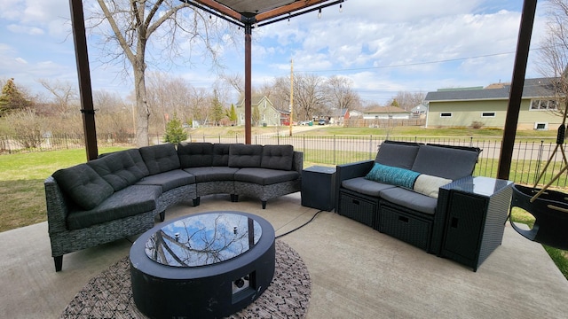 view of patio / terrace with an outdoor living space, a residential view, and a fenced backyard