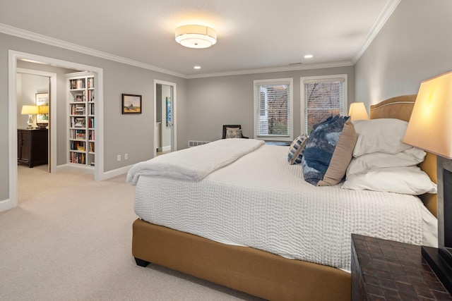 bedroom featuring crown molding and carpet flooring