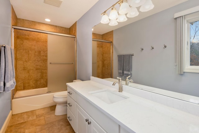 full bathroom with vanity, enclosed tub / shower combo, and toilet