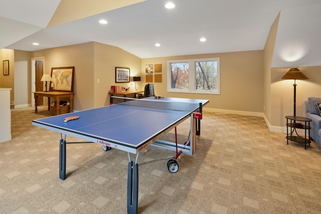 playroom featuring light colored carpet and vaulted ceiling