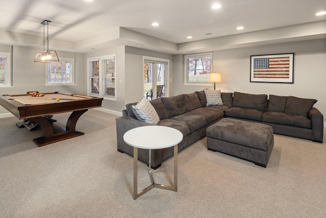 living room featuring light colored carpet and billiards