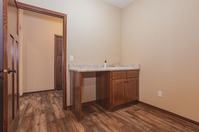 bathroom featuring hardwood / wood-style flooring and sink