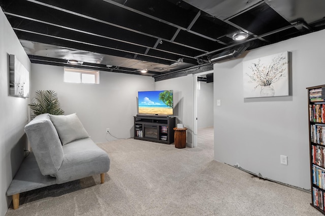 living area featuring carpet floors