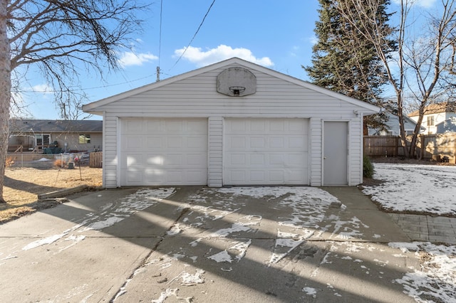 detached garage with fence