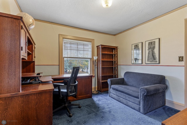 office area featuring crown molding, dark carpet, and a textured ceiling