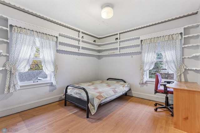 bedroom featuring hardwood / wood-style flooring