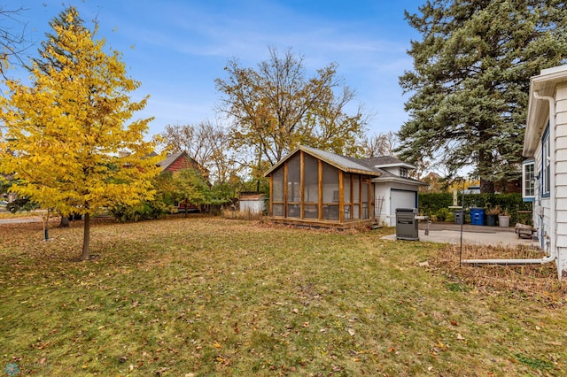 view of yard featuring a sunroom