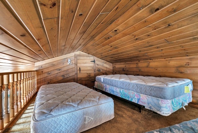 bedroom with wooden walls, wooden ceiling, lofted ceiling, and carpet floors