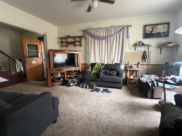 living room with carpet floors and ceiling fan