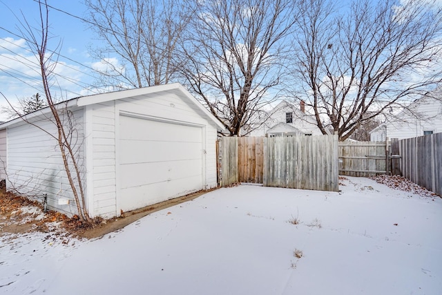 view of snow covered garage