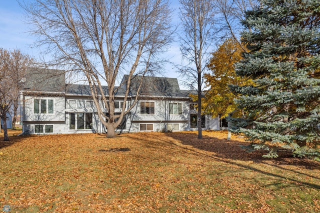 3509 7th St S, Moorhead, MN 56560 - rear view of house featuring a lawn