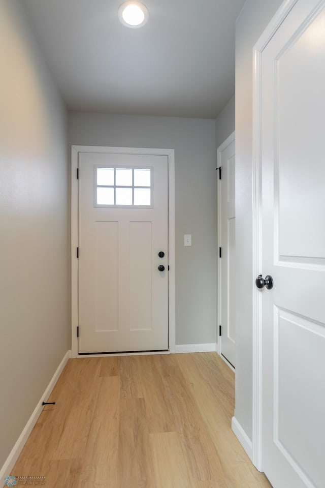 doorway to outside featuring light hardwood / wood-style floors