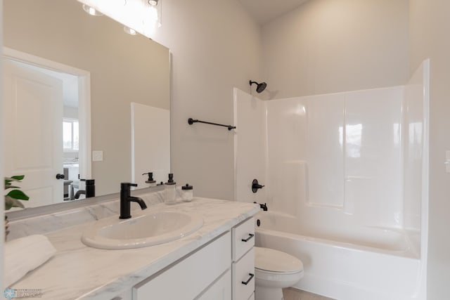 full bathroom with shower / tub combination, vanity, and toilet