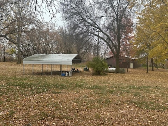 view of yard with a carport