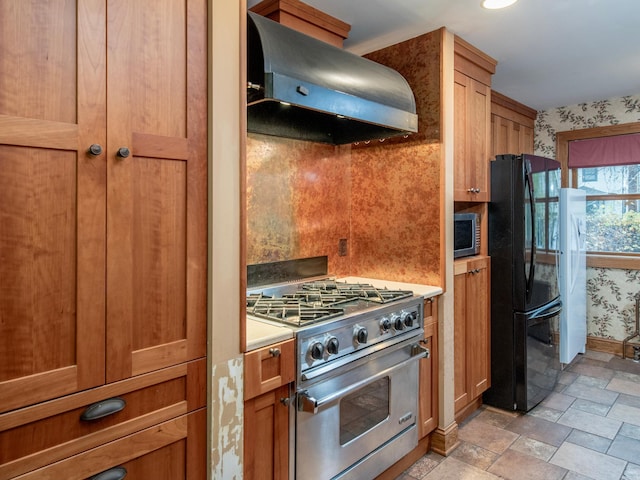 kitchen featuring extractor fan and stainless steel appliances