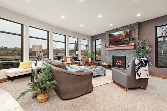 4637 Carlow Rd, Mound, MN 55364 - living area featuring recessed lighting, a stone fireplace, and baseboards