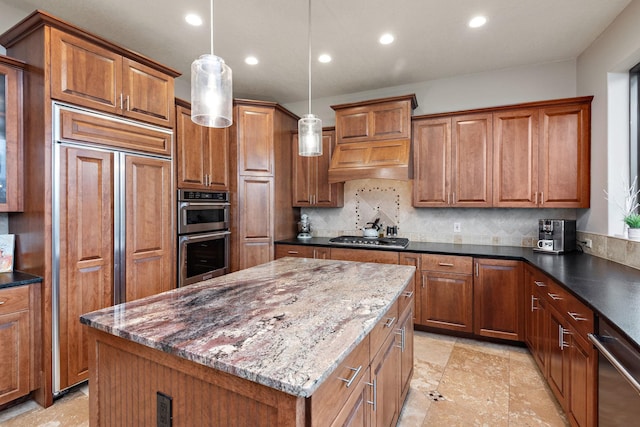 4637 Carlow Rd, Mound, MN 55364 - kitchen with stainless steel appliances, brown cabinets, and recessed lighting
