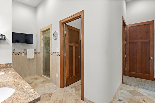 4637 Carlow Rd, Mound, MN 55364 - hallway featuring light stone finish floors