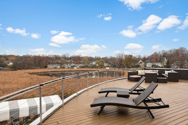 4637 Carlow Rd, Mound, MN 55364 - wooden terrace with an outdoor hangout area and view of wooded area