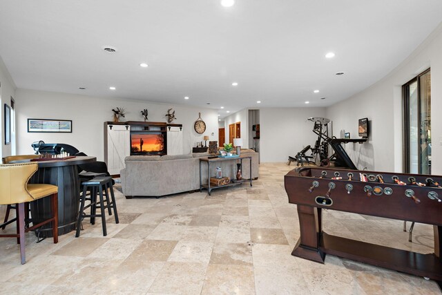 4637 Carlow Rd, Mound, MN 55364 - playroom featuring recessed lighting and a lit fireplace