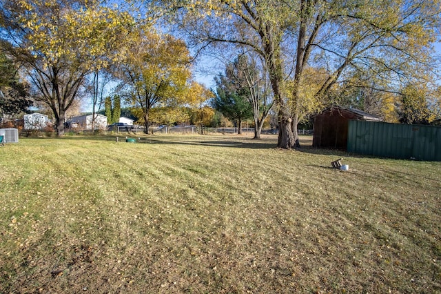 view of yard with central AC