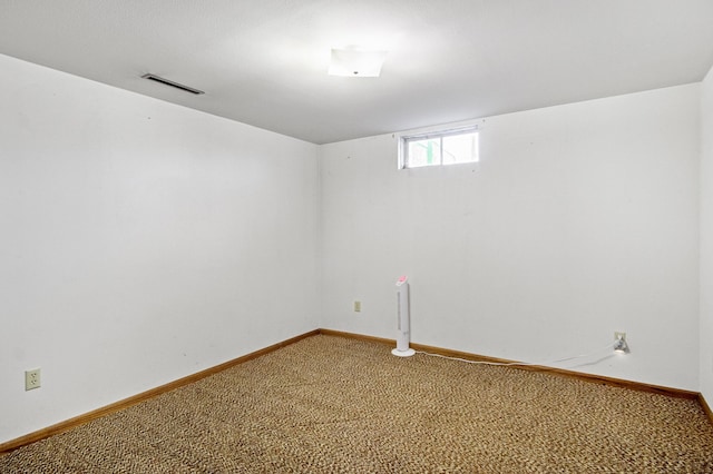 spare room with carpet