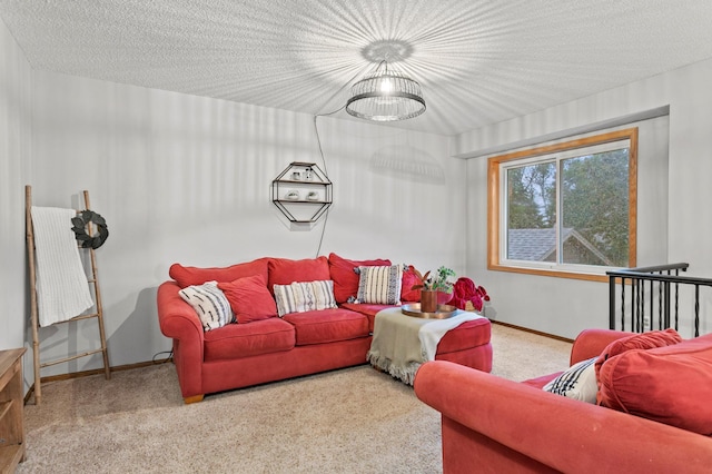 carpeted living room with a textured ceiling and a chandelier