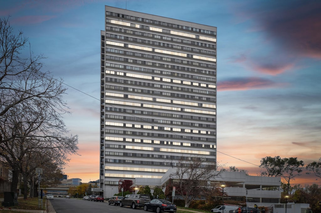 view of outdoor building at dusk