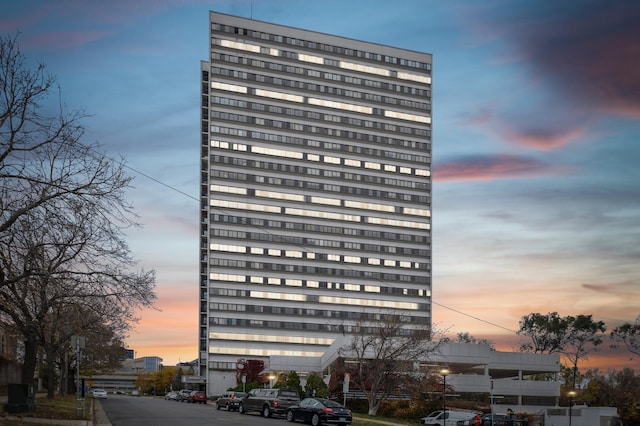 view of outdoor building at dusk