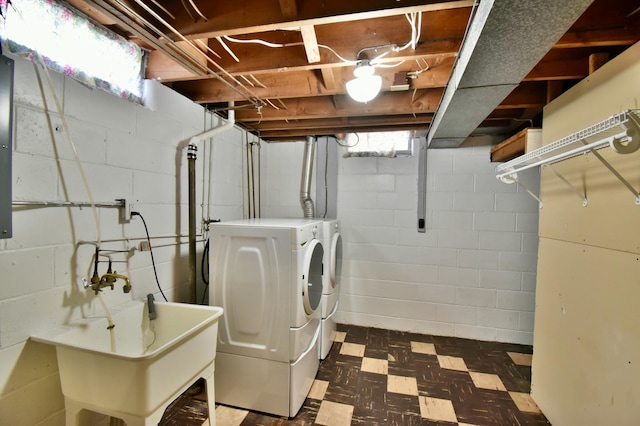 laundry room with sink and washing machine and clothes dryer