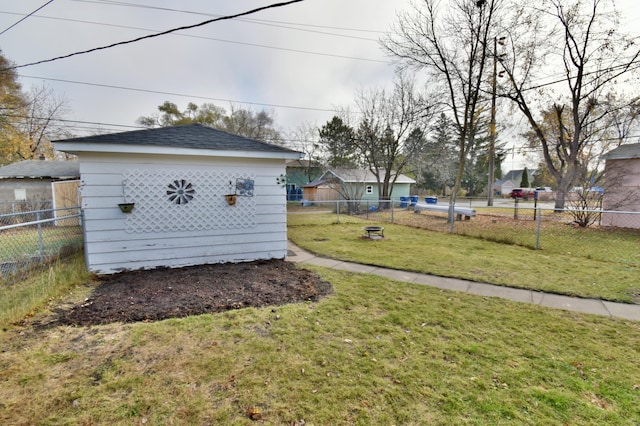 view of yard with a storage unit