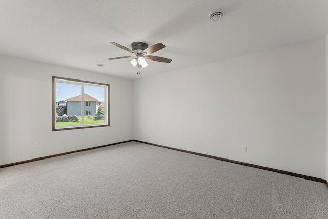 1067 241st Ln NE, East Bethel, MN 55005 - carpeted empty room with a ceiling fan and a smoke detector
