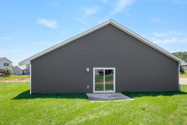 1067 241st Ln NE, East Bethel, MN 55005 - back of house featuring a yard and a patio