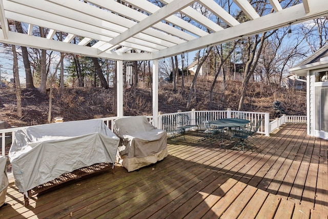 wooden deck featuring a pergola